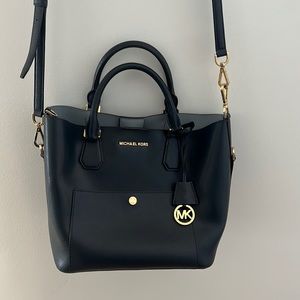 Michael Kors navy blue large purse with gold details. Like new!